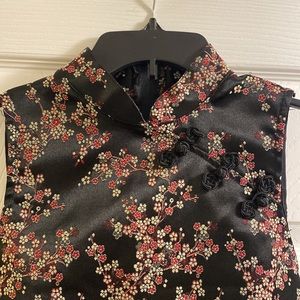 Size small Chinese cheongsam/qipao inspired black top. Fitted with zipper